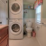 Carriage House Laundry Machines In Bathroom